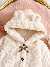 Baby girl hooded cape with button closure and wide hem
