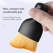 Nail art dust brush for removing acrylic dust from nails.