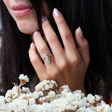 Luxury geometric gold cubic zirconia wedding ring close-up