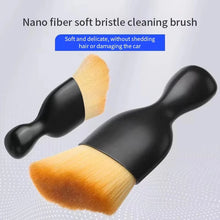 Nail art dust brush for removing acrylic dust from nails.