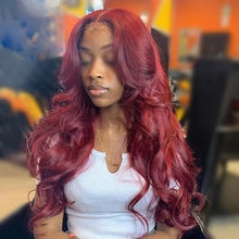 Curly wine red long wig side profile showing full curly wave texture.