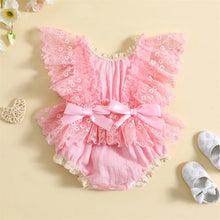 Baby girl lace bodysuit worn by a baby girl