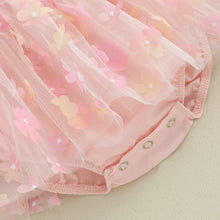 Baby girl romper dress worn by a baby girl