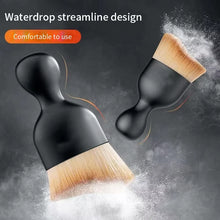 Nail art dust brush for removing acrylic dust from nails.