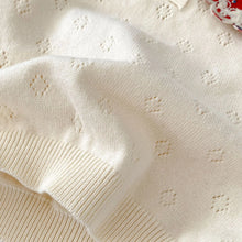  Baby girl knitted top worn by a little girl