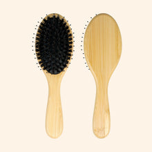 Hairbrush with Wooden' Handle.