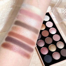 Eyeshadow palette shimmer matte applied for bold evening eye look.