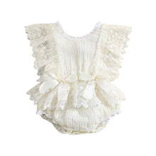 Baby girl lace bodysuit worn by a baby girl