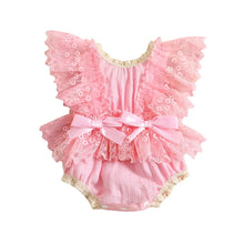 Baby girl lace bodysuit worn by a baby girl