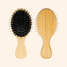 Hairbrush with Wooden' Handle.
