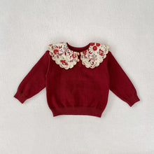  Baby girl knitted top worn by a little girl