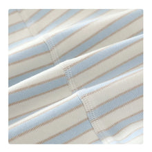 Cotton baby onesie worn by a baby