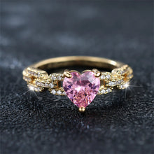 Pink diamond heart ring with sparkling heart-shaped stone