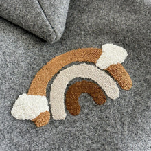 Rainbow baby jumpsuit with an attached winter hood