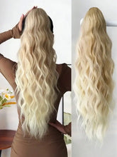Long wavy synthetic wig 26-28 inch heat resistant fiber in natural styling.