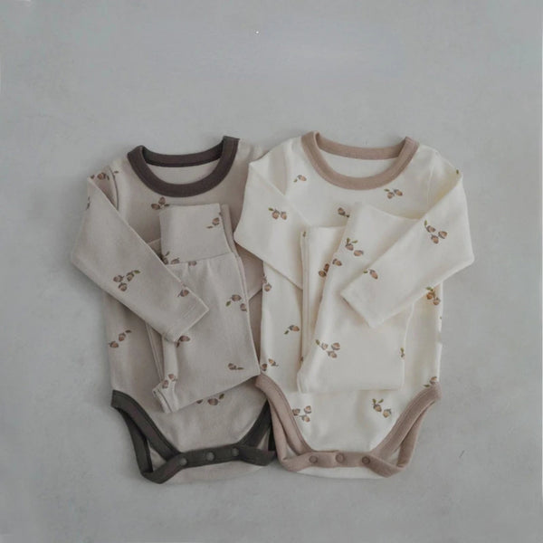  Baby romper and pants set worn by a baby