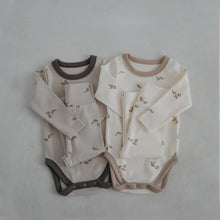  Baby romper and pants set worn by a baby