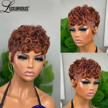 Human hair wig with bangs available at Her Wardrobe & Beyond.