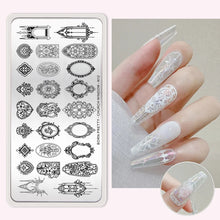 Nail stamping plates in use — applying polish for a DIY nail art transfer.